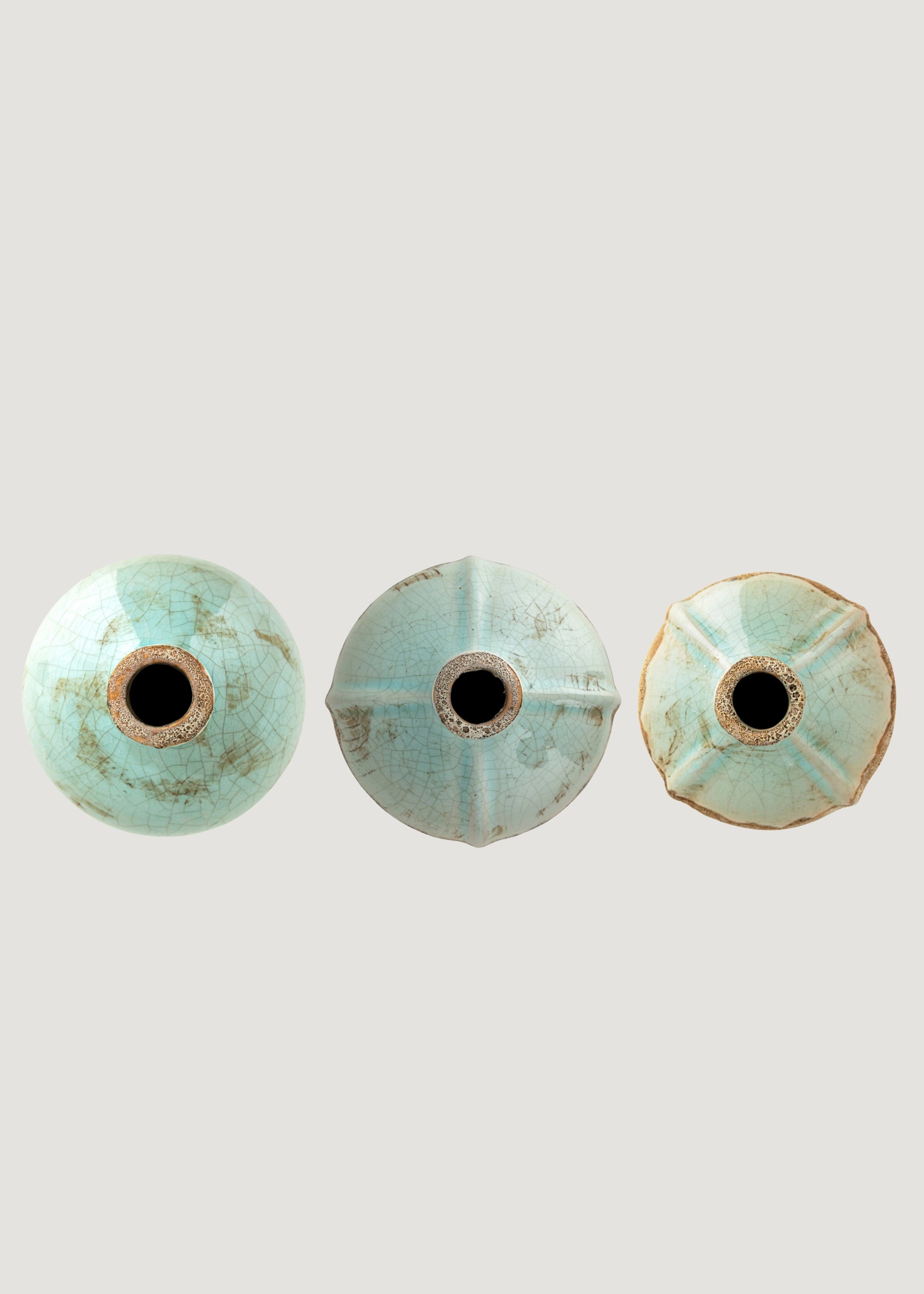 The openings of the Terra Cotta Bud Vases