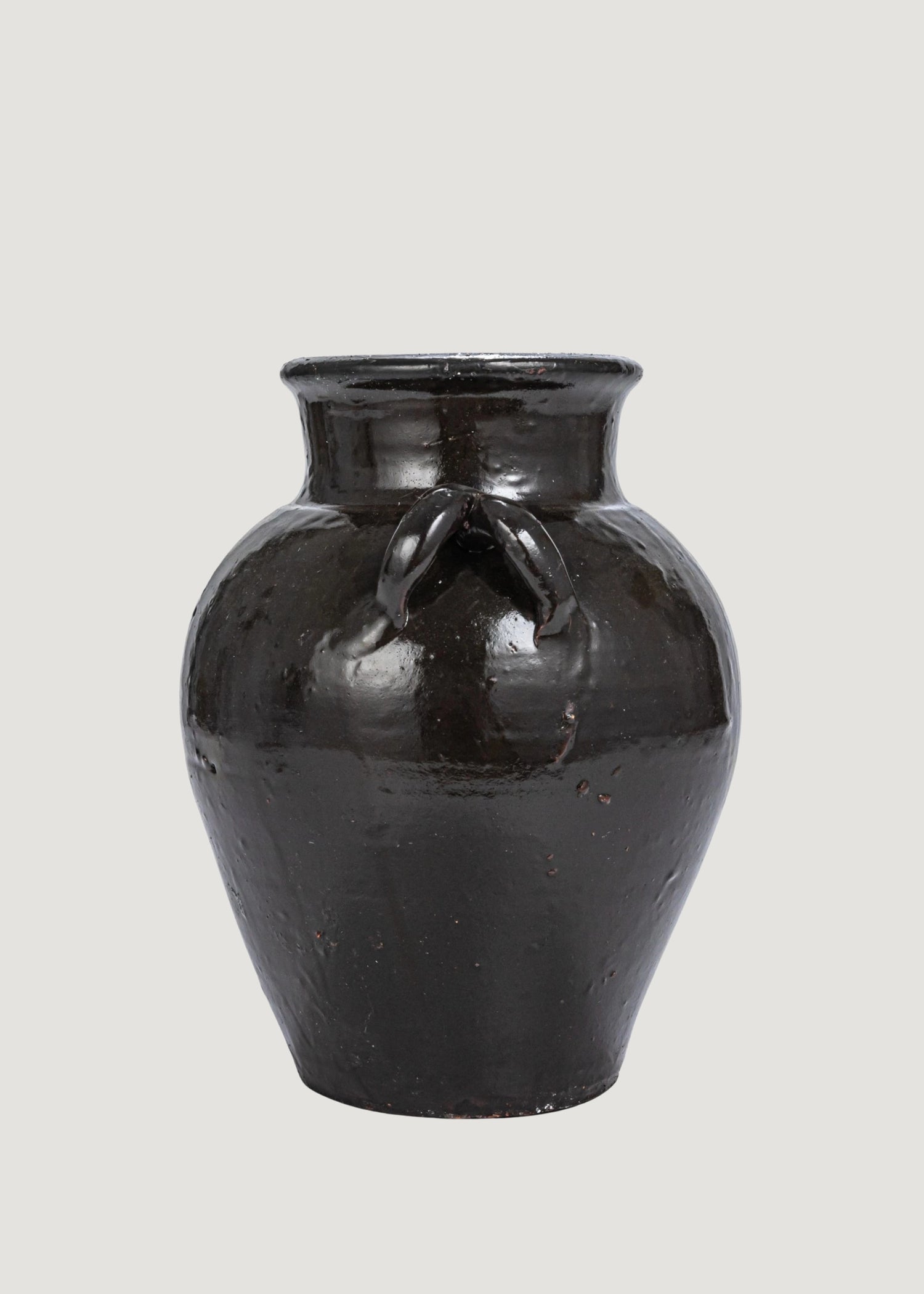 Handles of the Distressed Clay Jar Vase