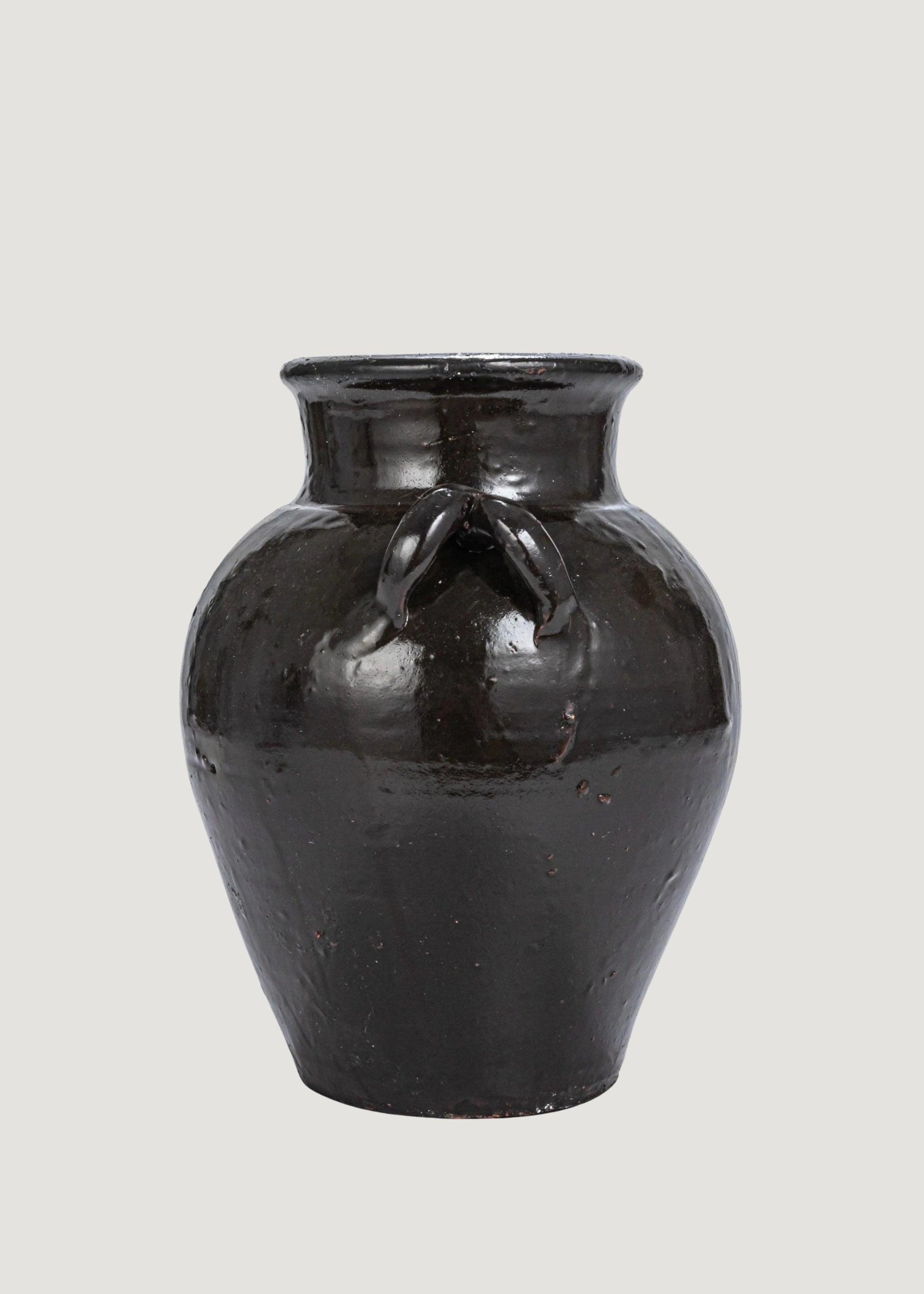 Handles of the Distressed Clay Jar Vase