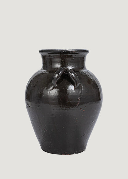 Handles of the Distressed Clay Jar Vase