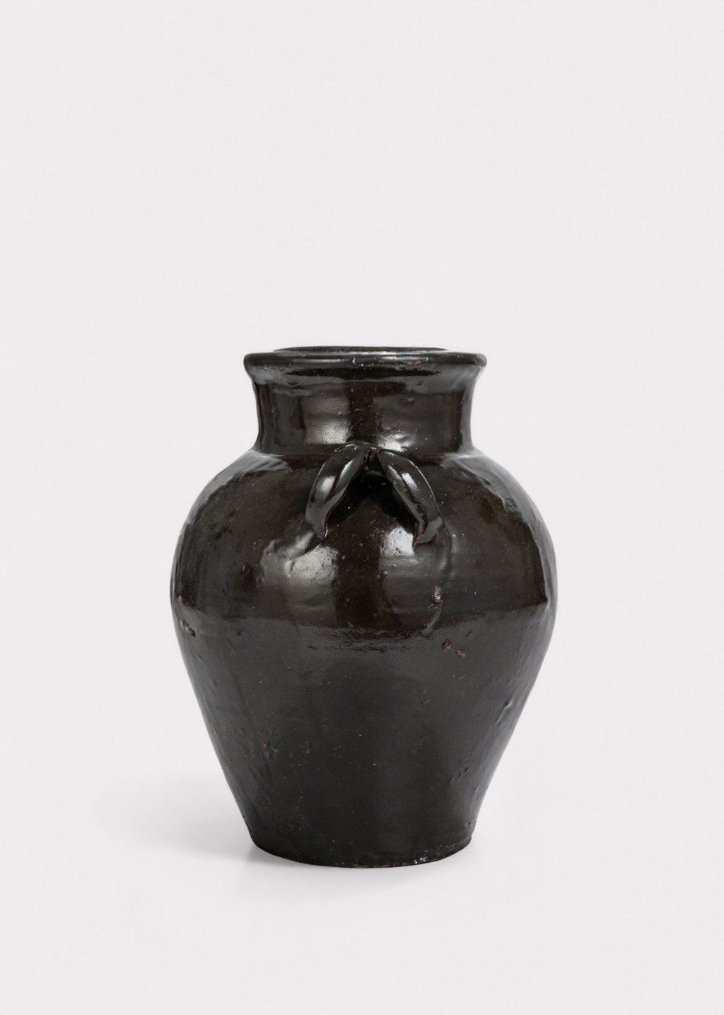Handles of the Distressed Clay Jar Vase