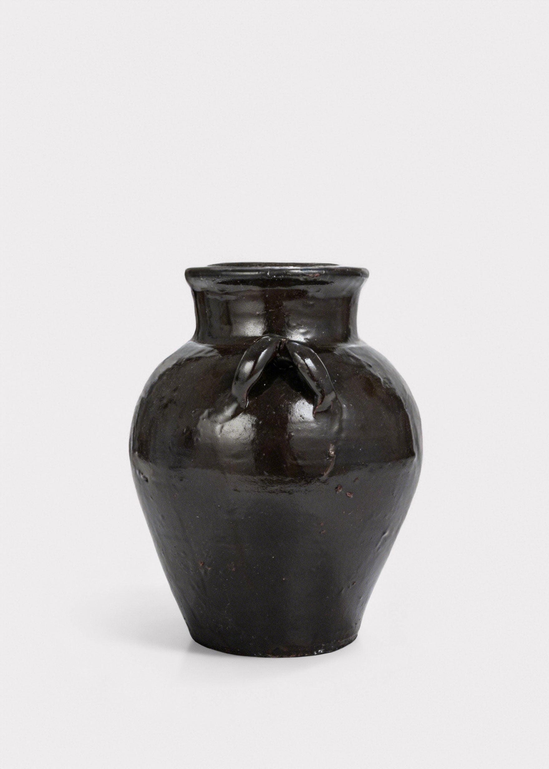 Handles of the Distressed Clay Jar Vase