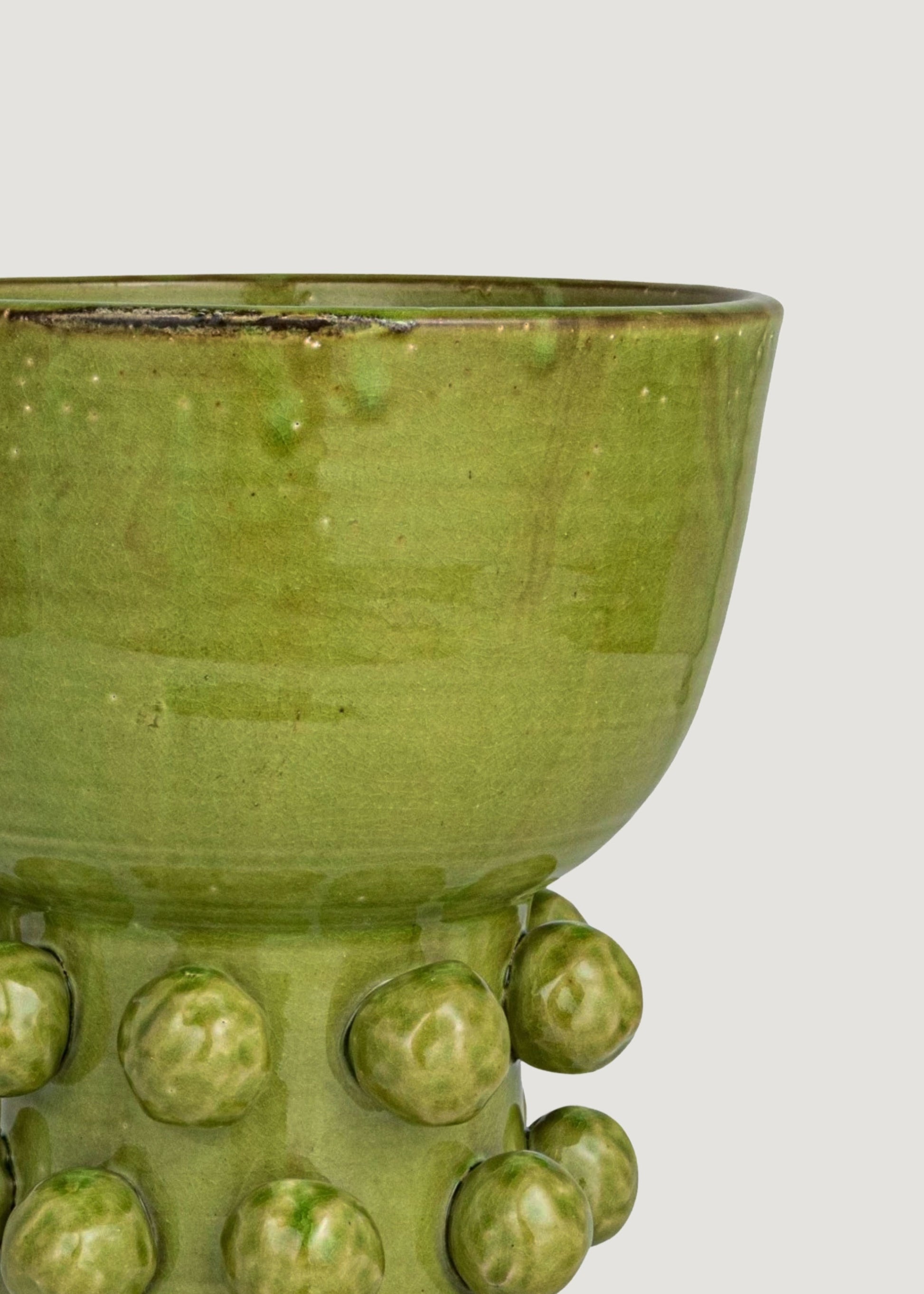 Close-up of Glazed Green Hobnail Vase 