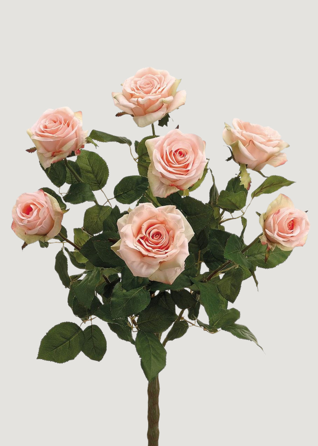 Artificial pink roses with green leaves 