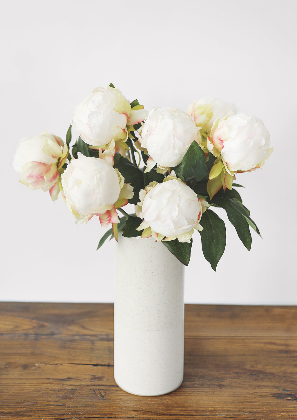 white peony buds in vase