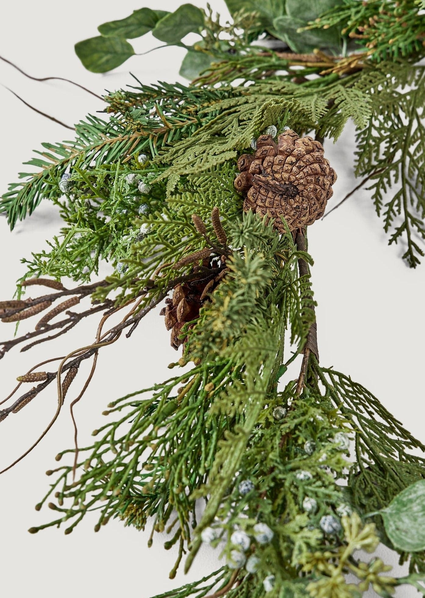 Realistic Artificial Cedar and Pine Garland with Cones Winter Decor at Afloral