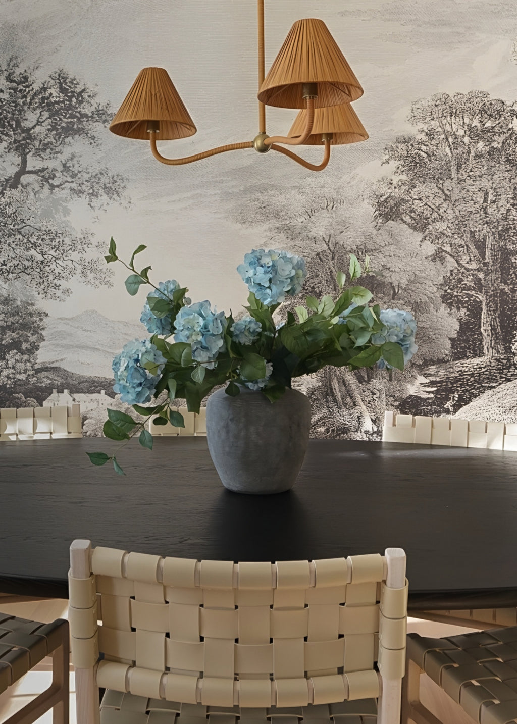 hydrangea arrangement in cement vase