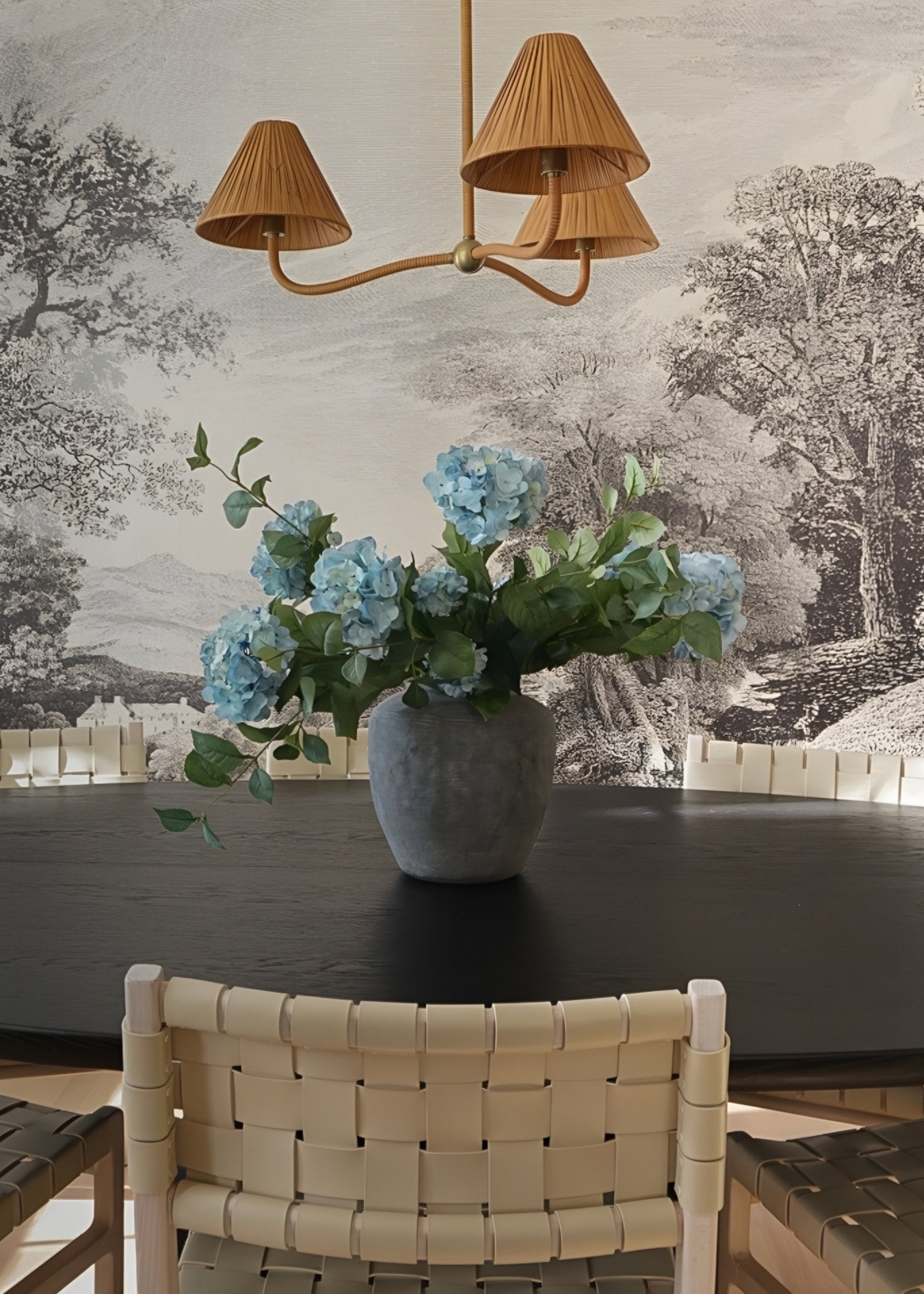 hydrangea arrangement in cement vase