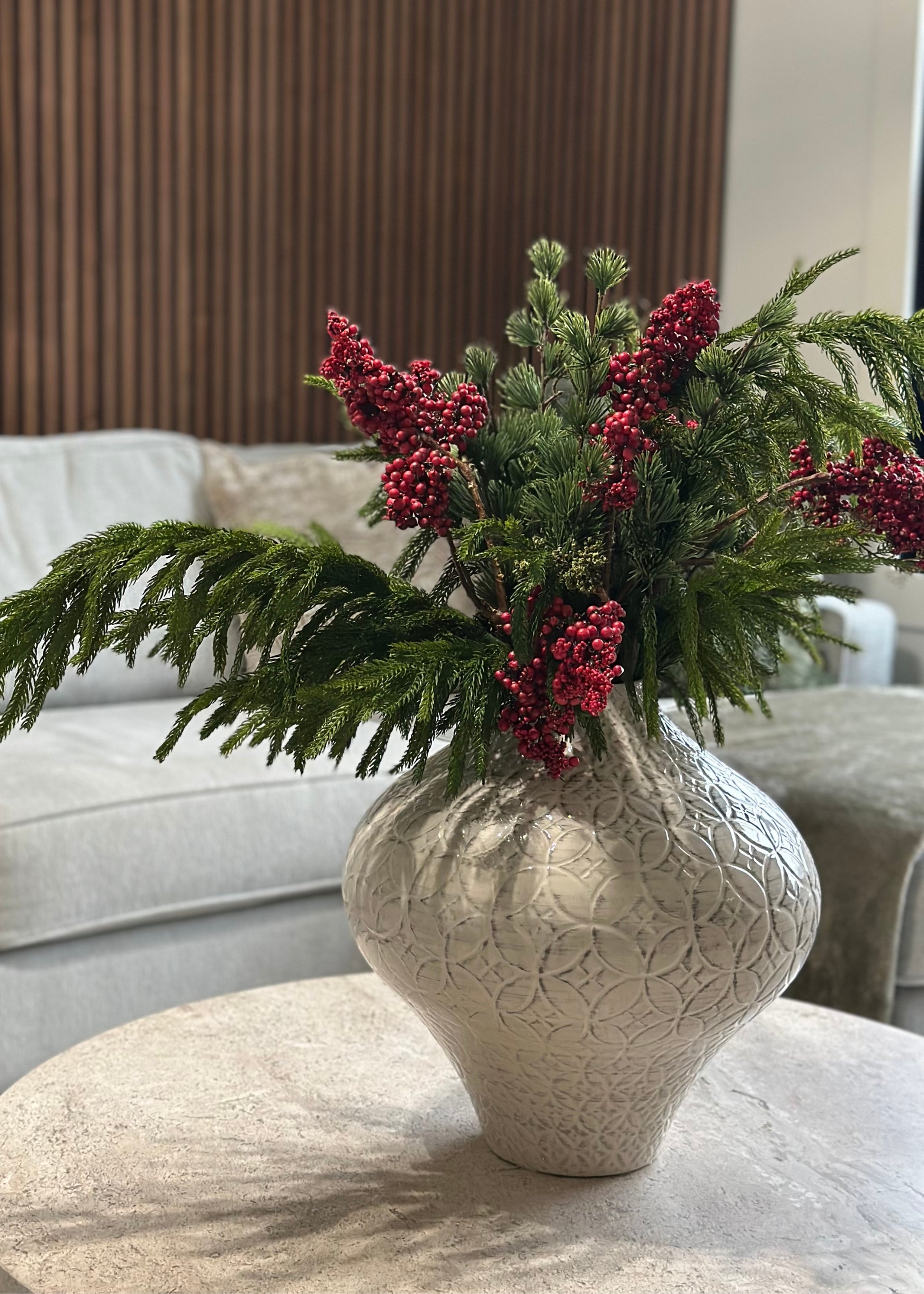 artificial larch and norfolk pine arrangement with red berries