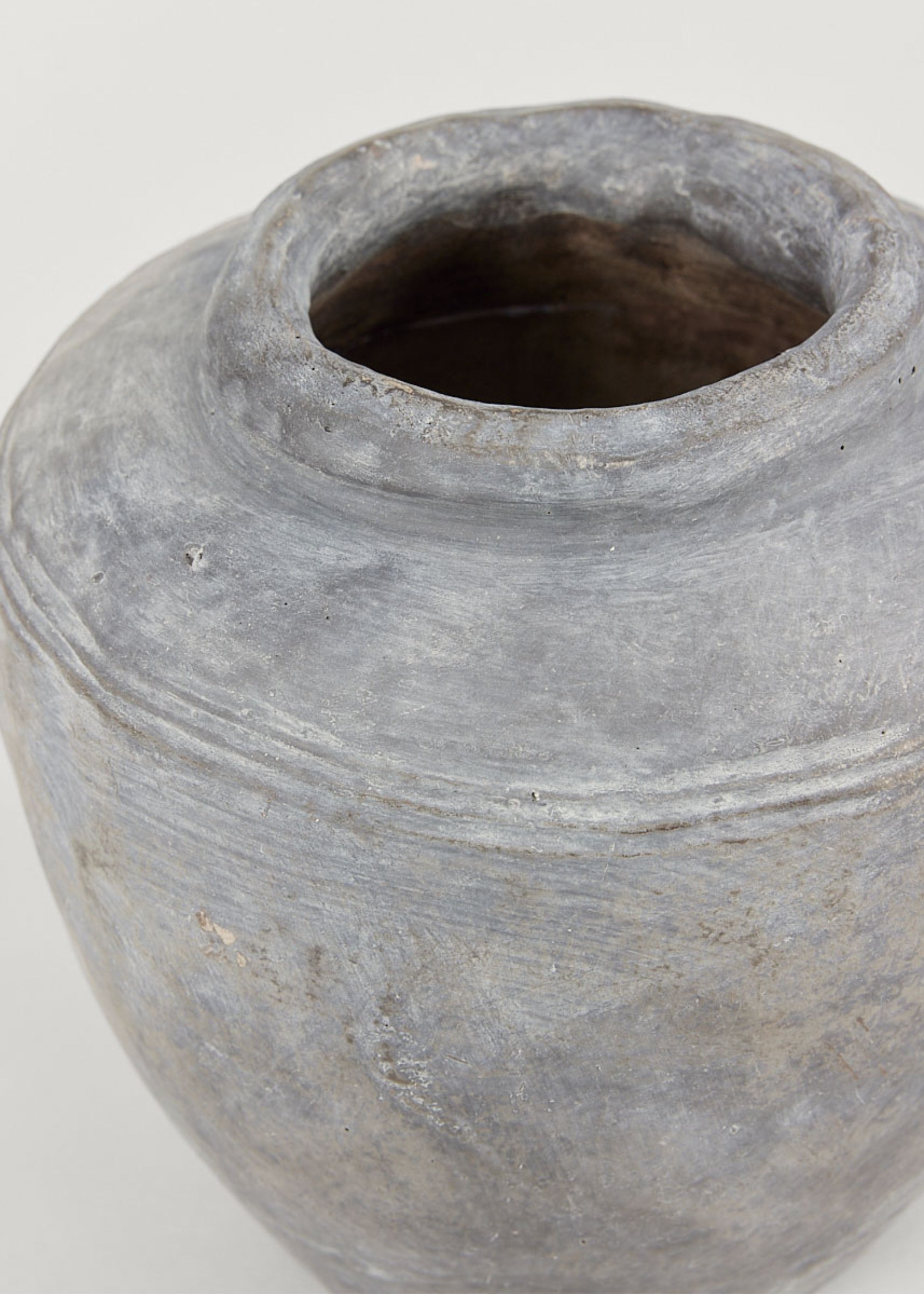 Close Up of Large Distressed Concrete Vase in Gray at Afloral