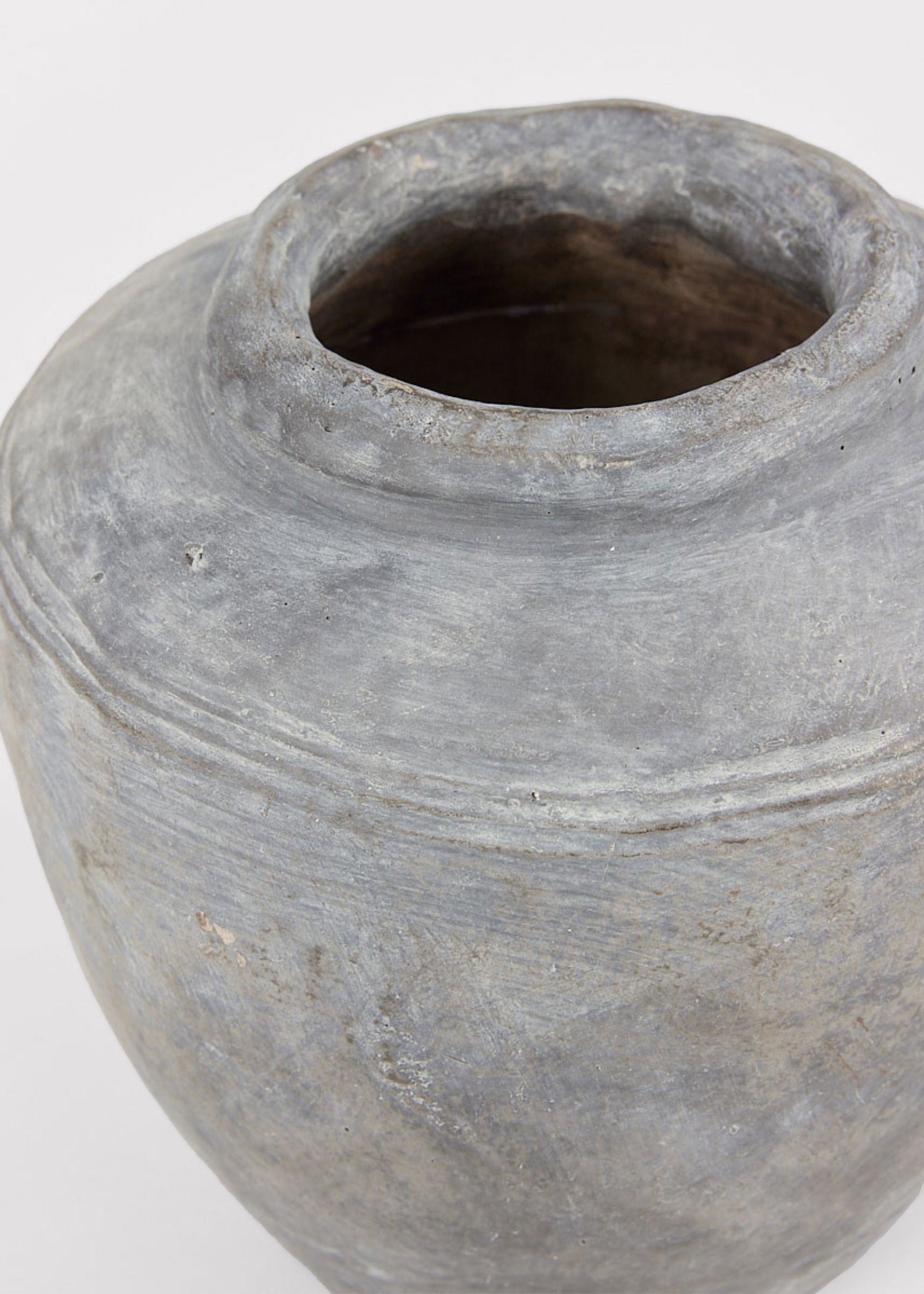 Close Up of Large Distressed Concrete Vase in Gray at Afloral