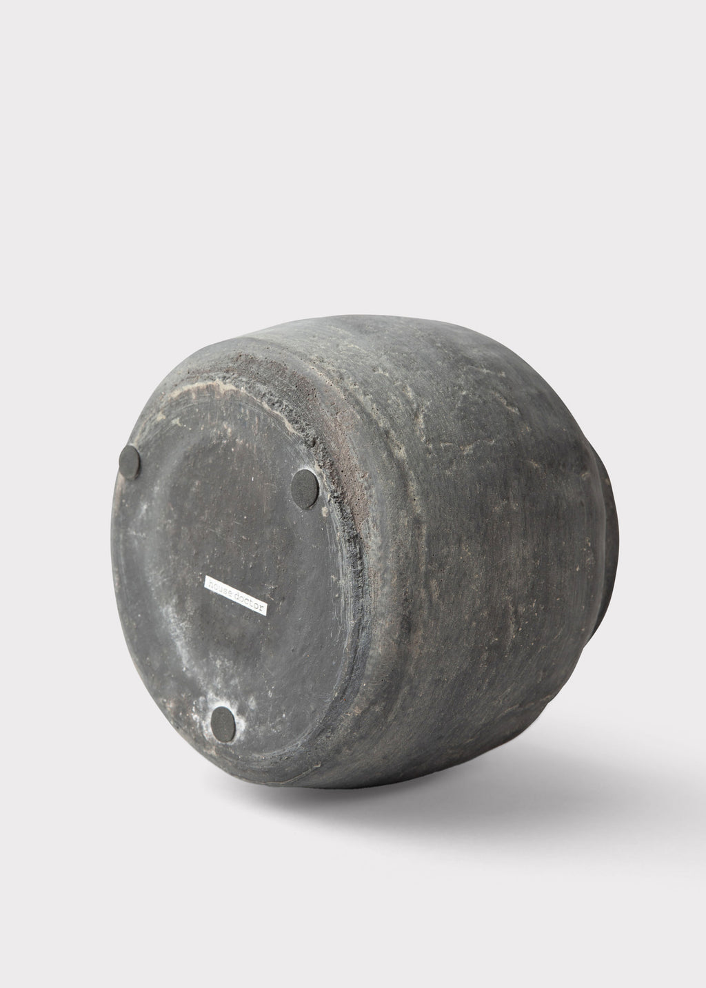 Bottom of Distressed Concrete Clay Vase