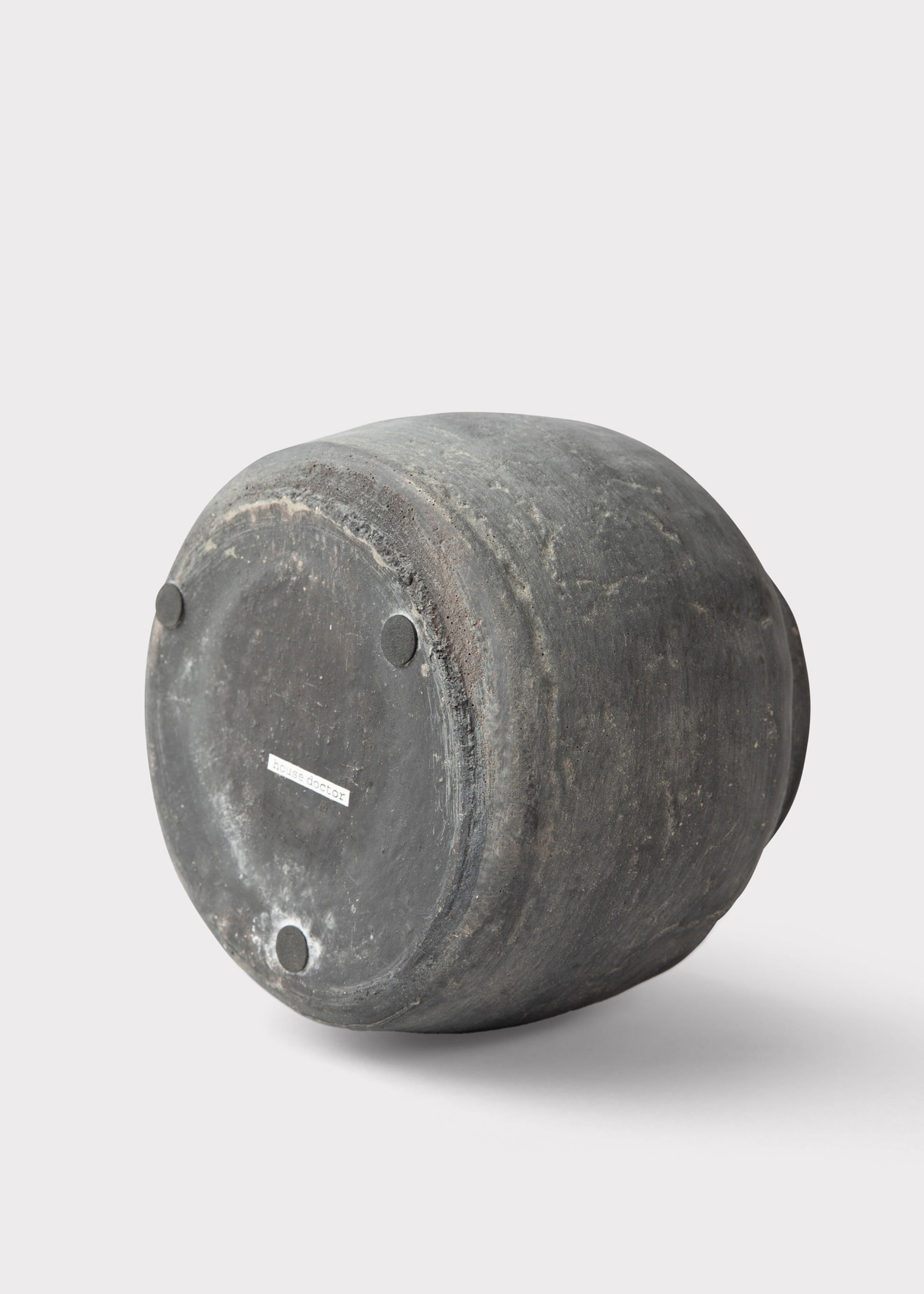 Bottom of Distressed Concrete Clay Vase