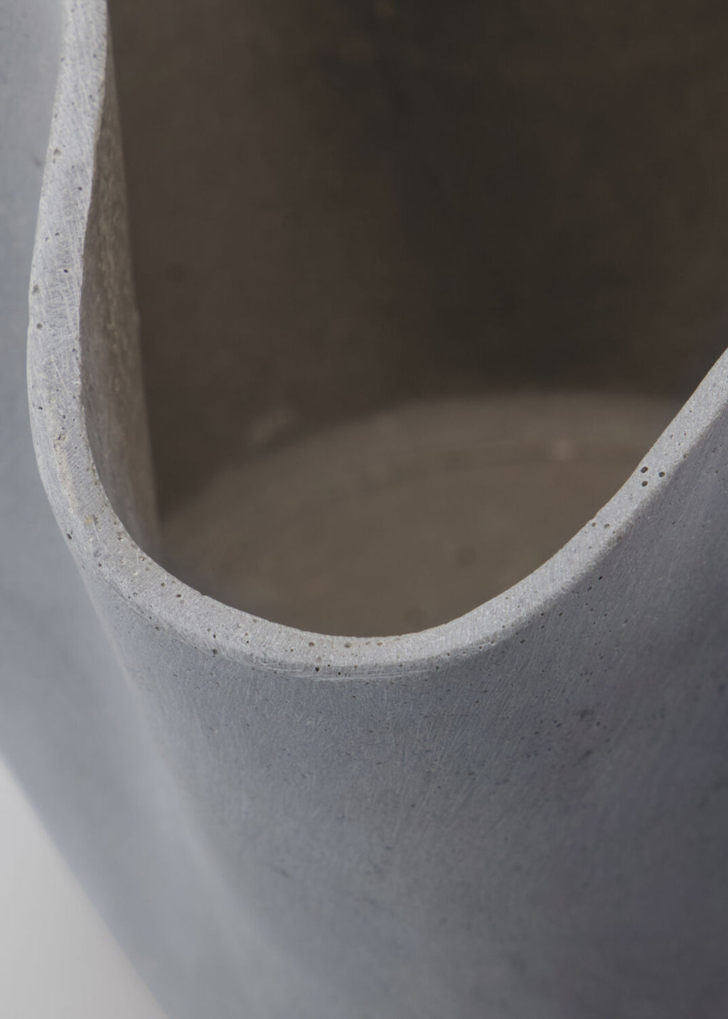 Close-up of a Handmade Polyresin Wavy Planter in Grey