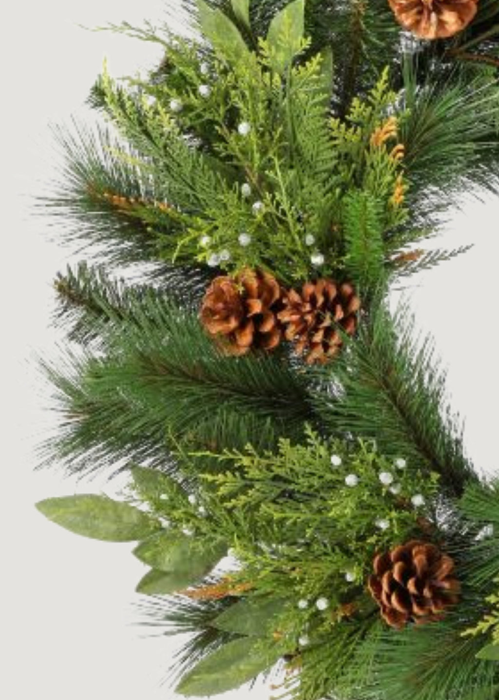 Close-up of Juniper and Cedar Wreath with Pine Cones