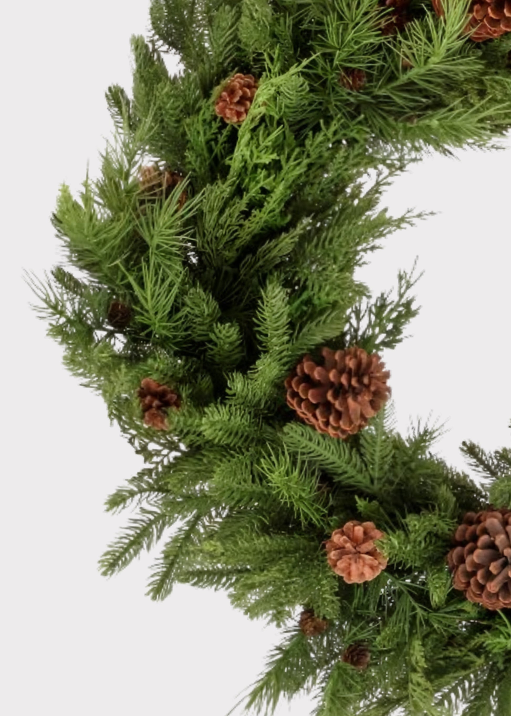Close-up of a Natural Touch Fake Mixed Greenery and Pinecone Holiday Wreath