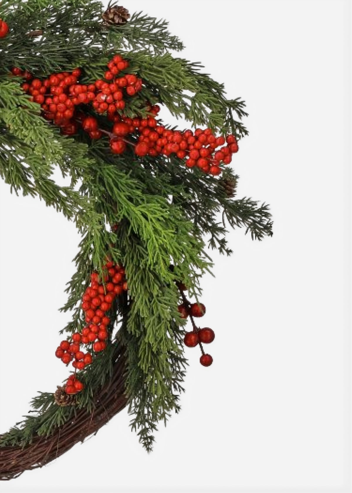 Close-up of Christmas Evergreen and Red Berry Artificial Wreath