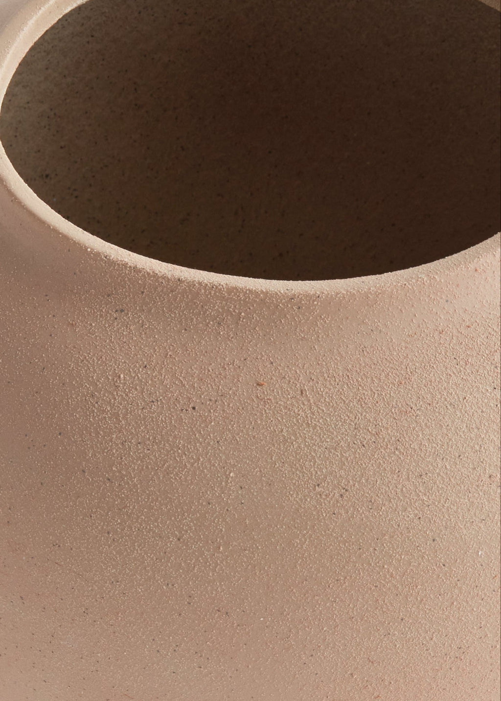 Closeup of a Large Handmade Stoneware Vase in Tan 