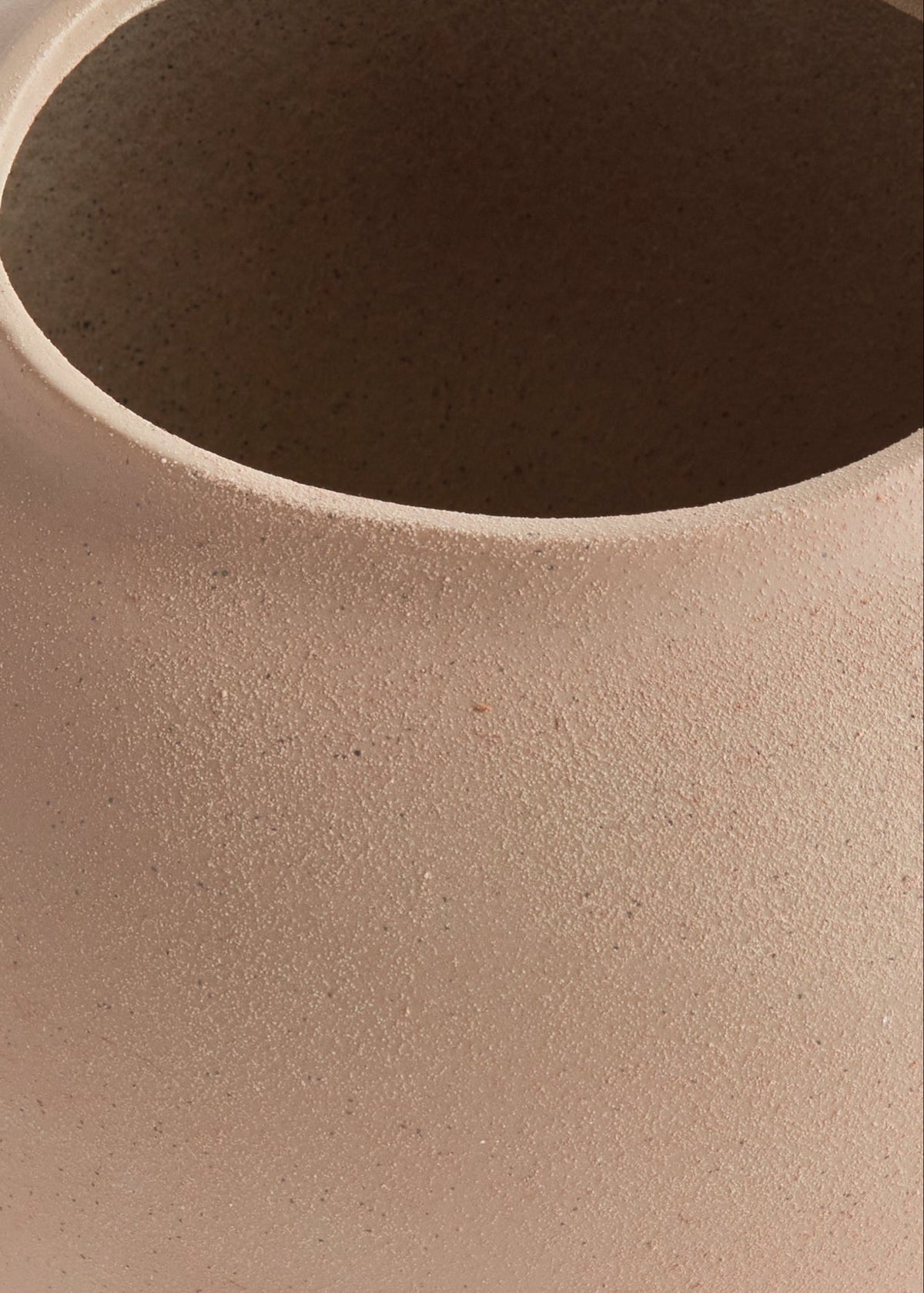 Closeup of a Large Handmade Stoneware Vase in Tan 