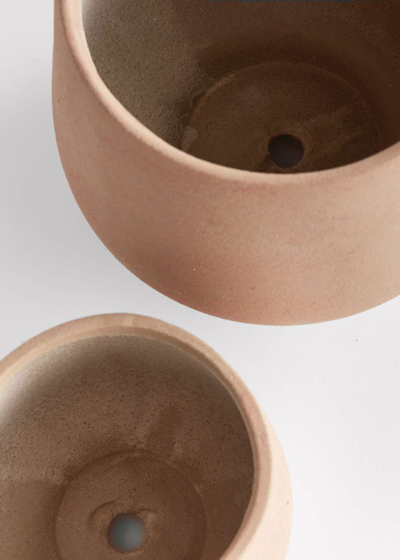 Inside of 2 Stoneware pots