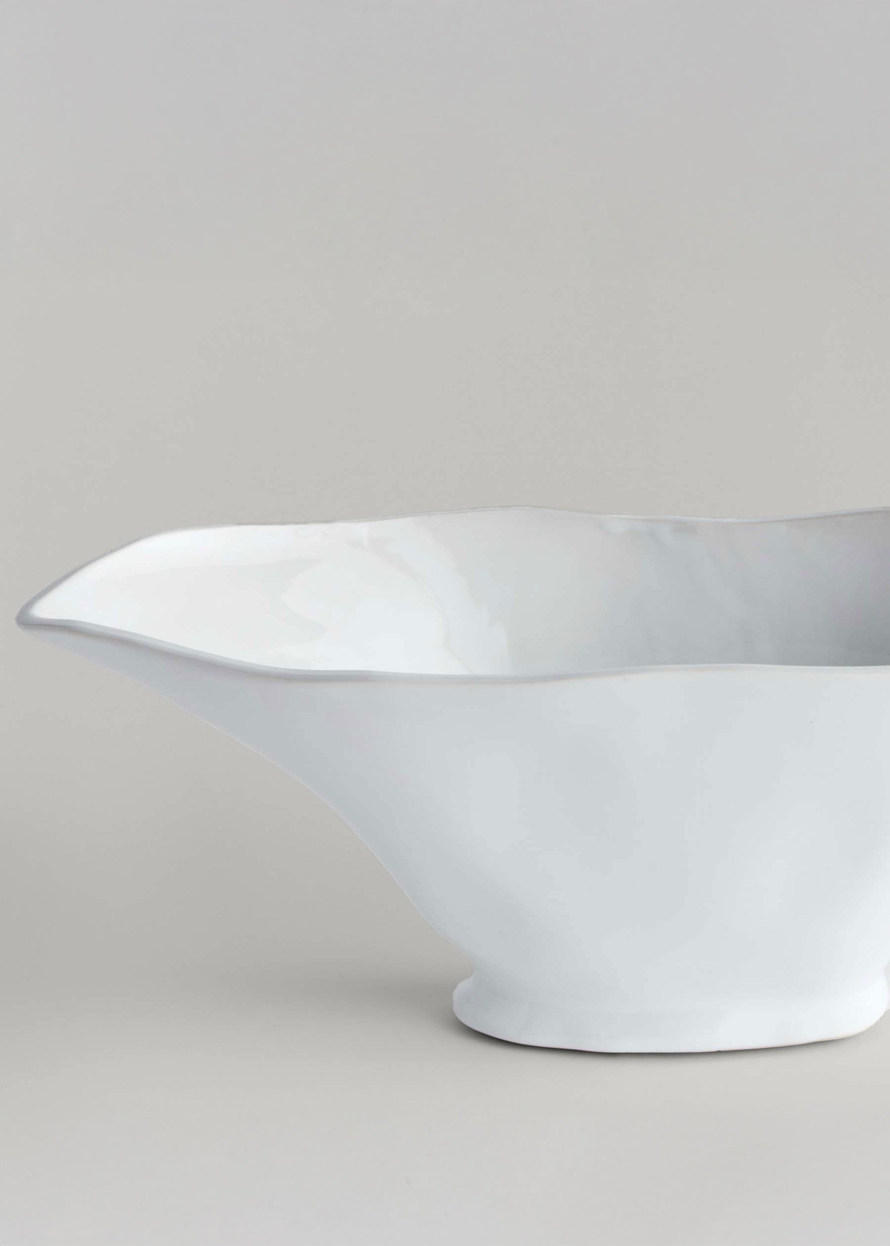 Close-up of Handmade Ceramic Oval Vase in White