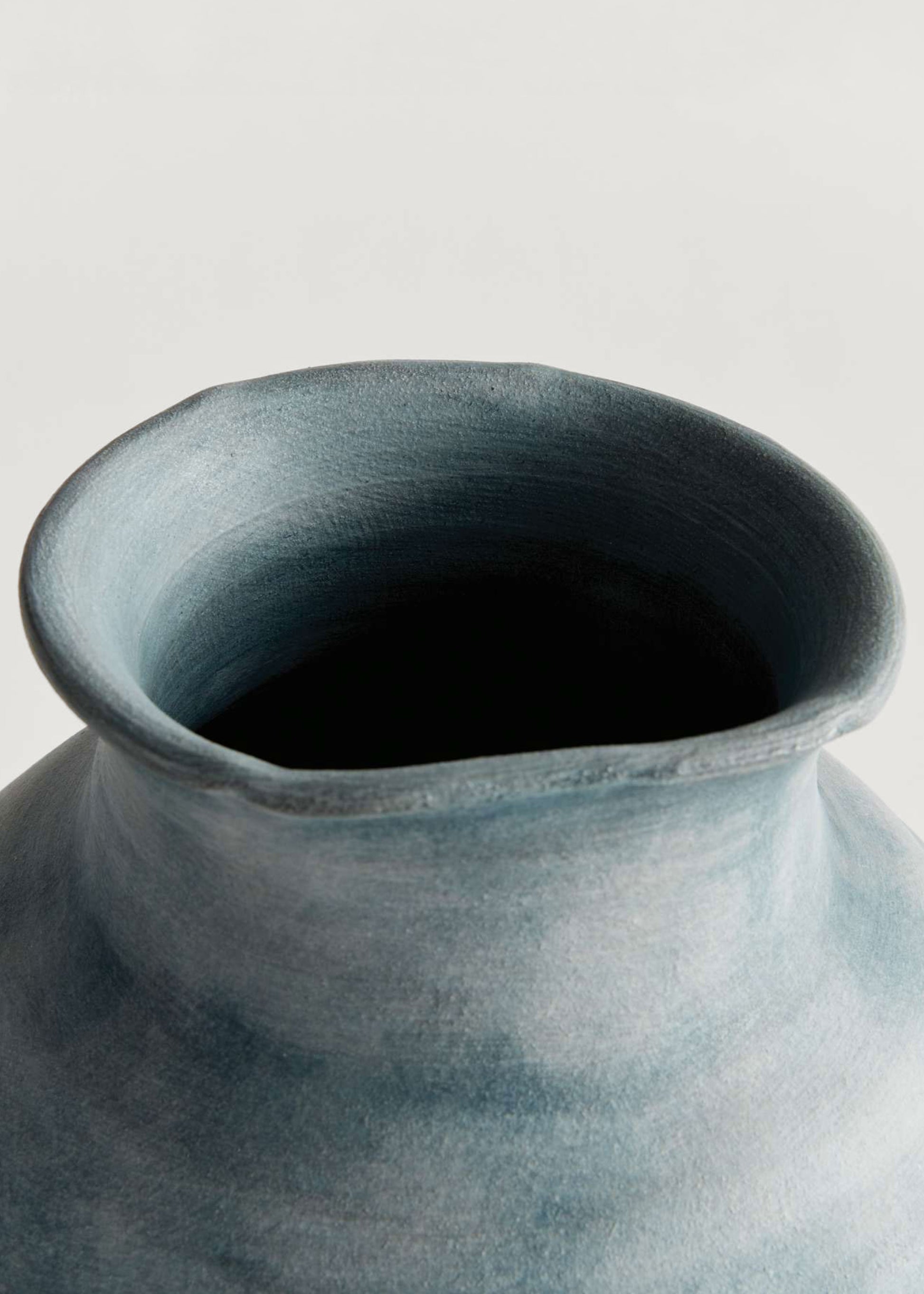 Close-up of a textured blue vase