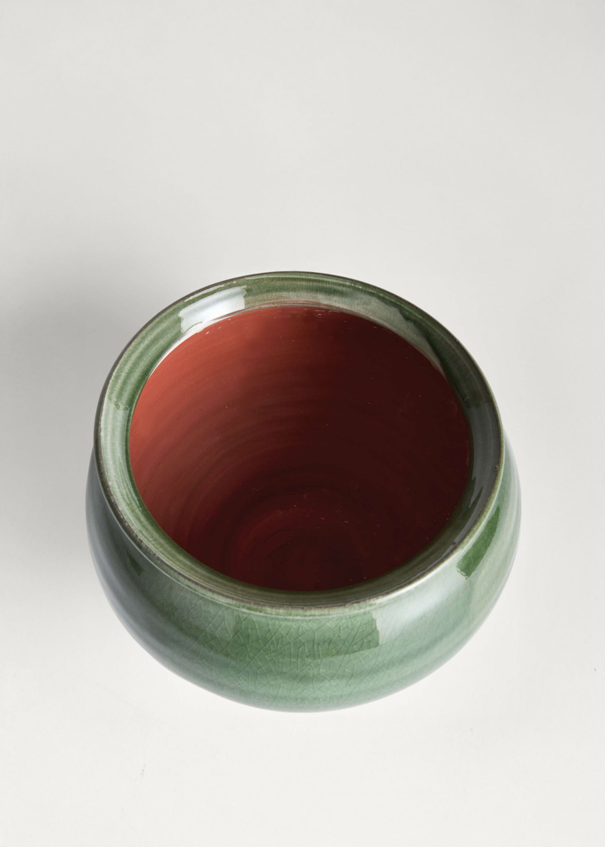 Opening of the green terra cotta vase