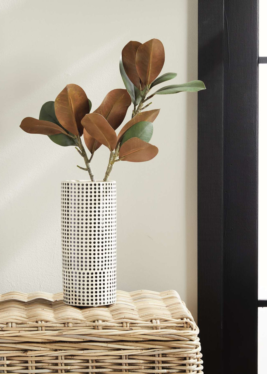 White and Black spotted Cylinder Vase with magnolia leaves