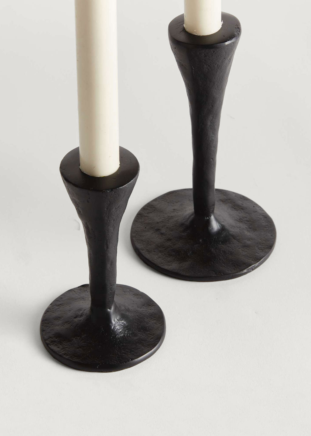 Two black candle holders