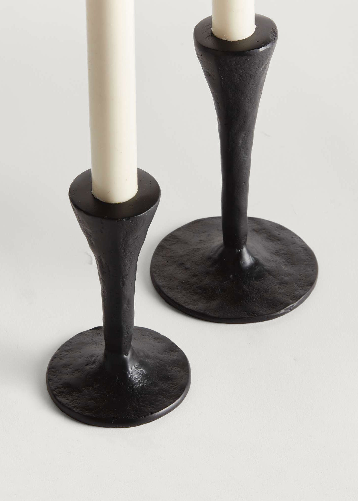 Two black candle holders