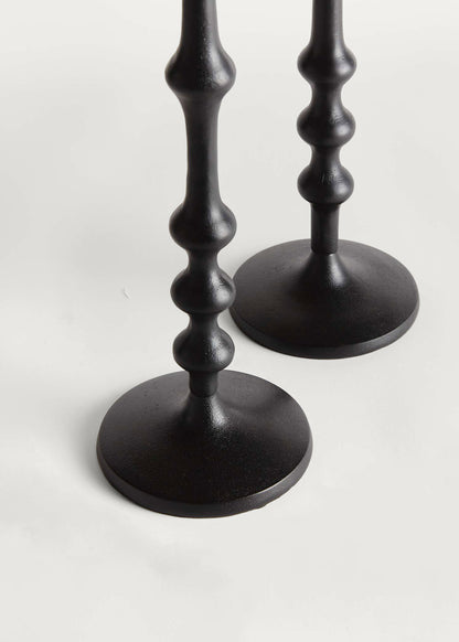 Two black candle holders