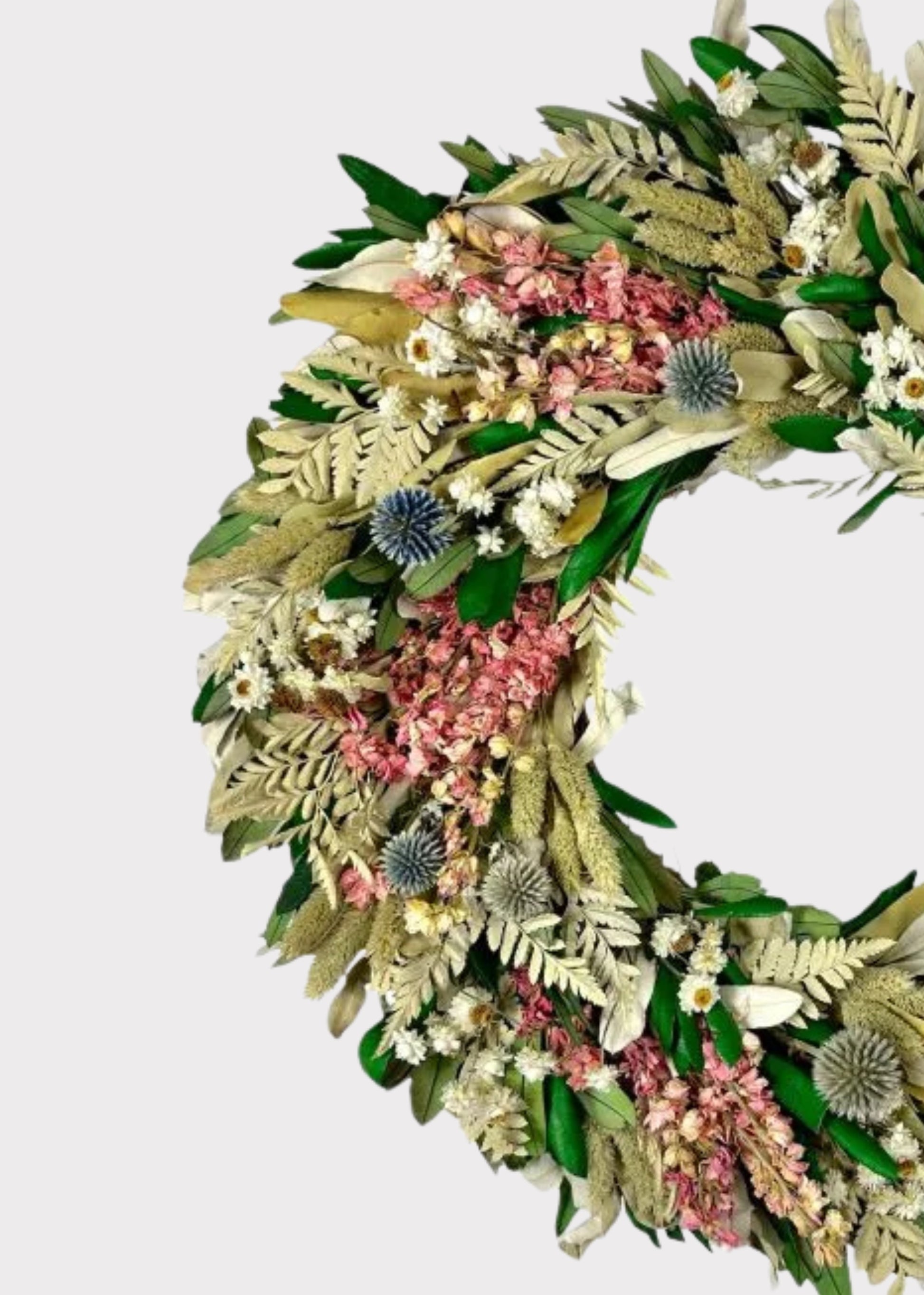 Close-up of a Pink Dried Larkspur and Mixed Foliage Flower Wreath