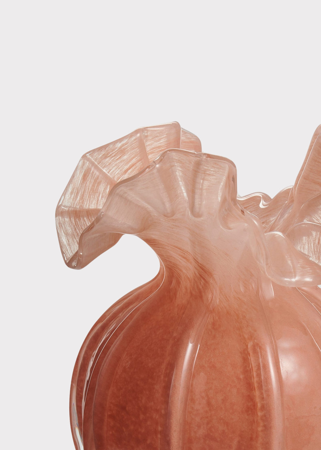 Close-up of salmon pink ruffle vase