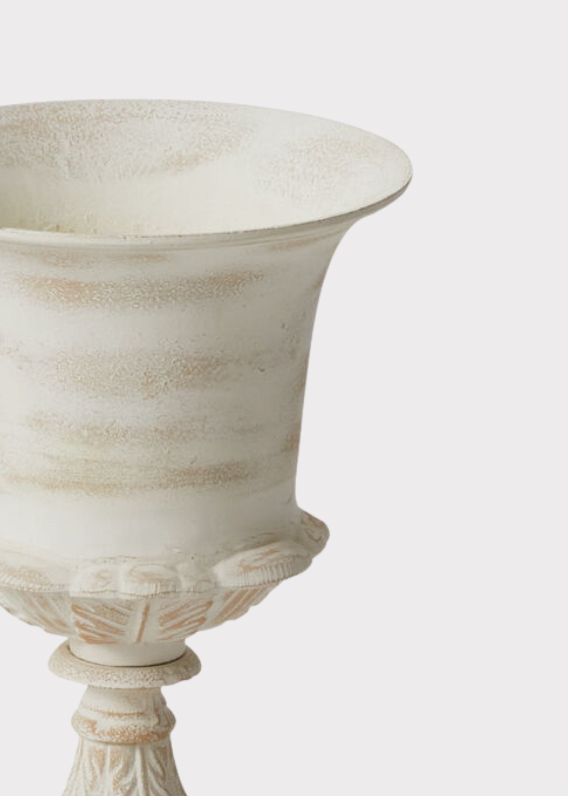 Close-up of a Distressed Metal Urn