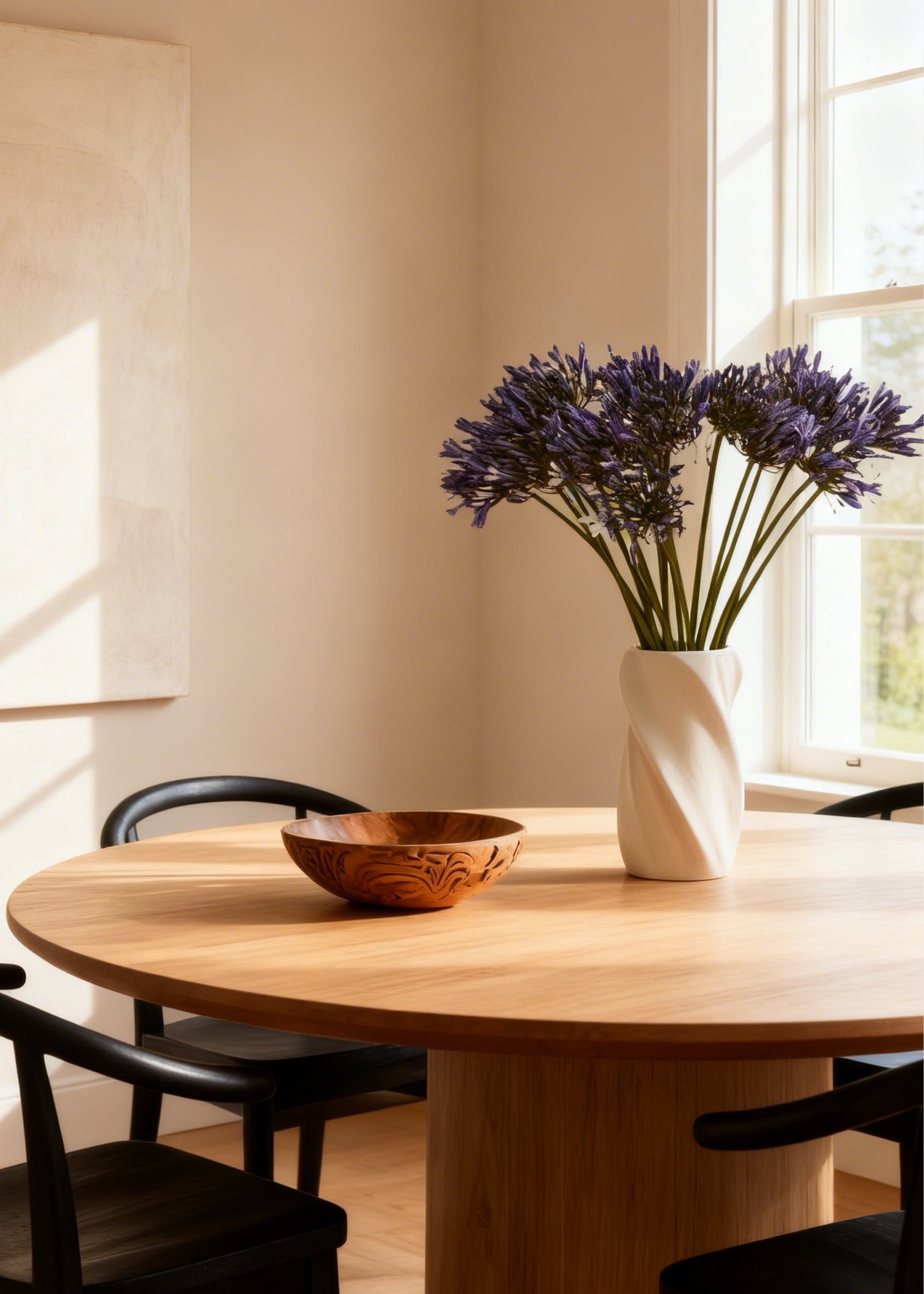 white ceramic twist vase with flowers