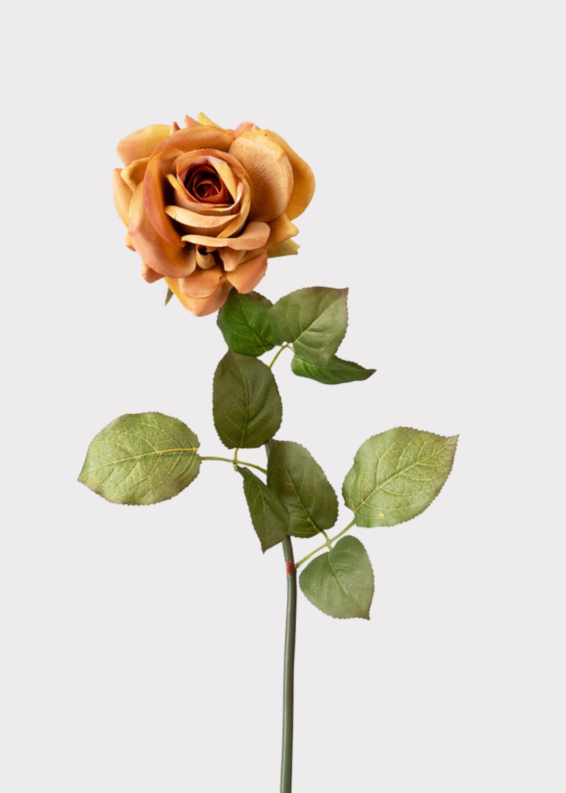 Single artificial orange rose