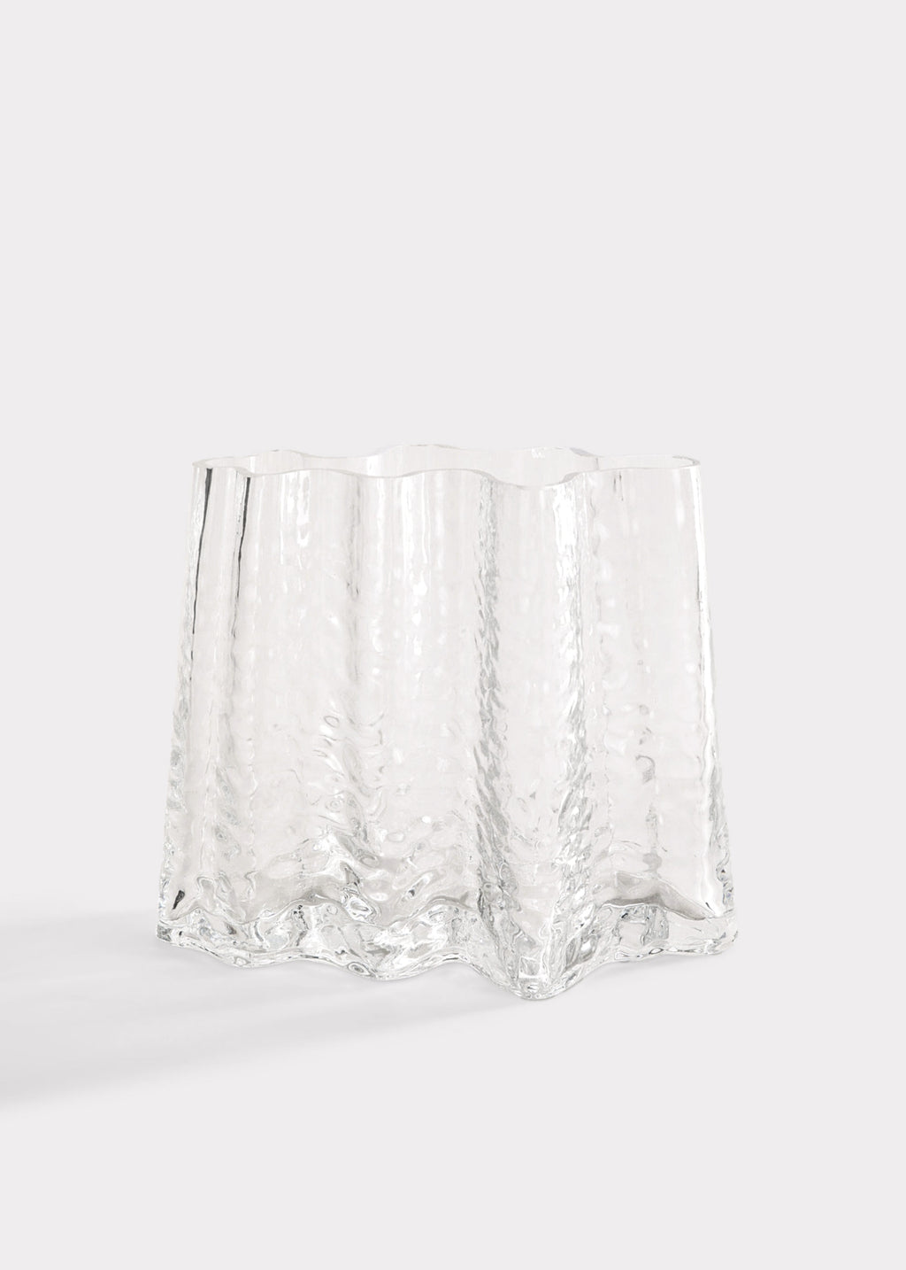 Clear glass vase with textured surface 