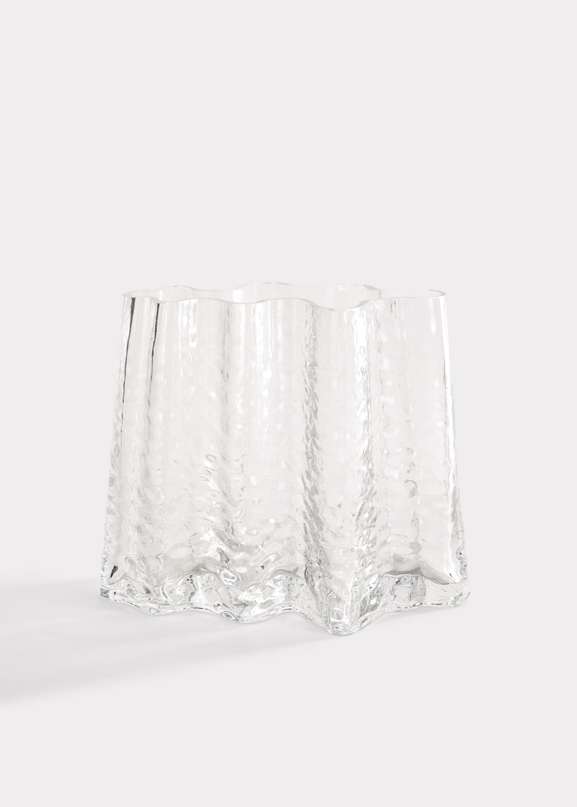 Clear glass vase with textured surface 