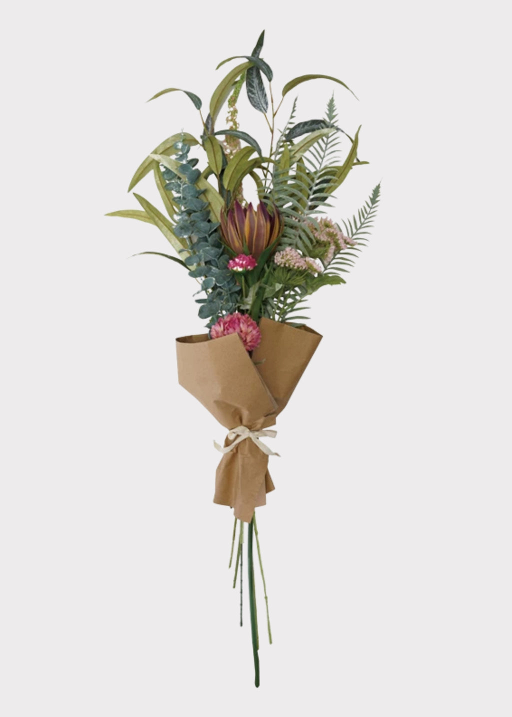 Bouquet of flowers wrapped in brown paper