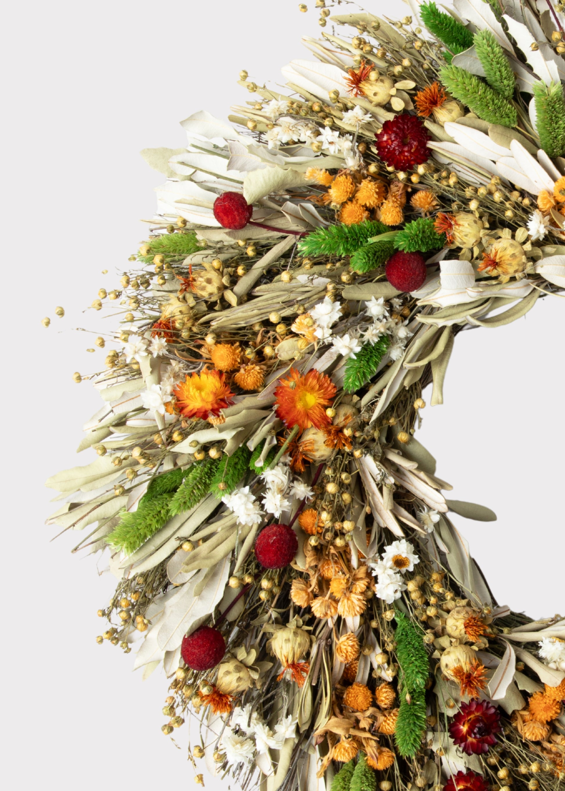 Close-up of Green and Orange Mixed Flowers Wreath