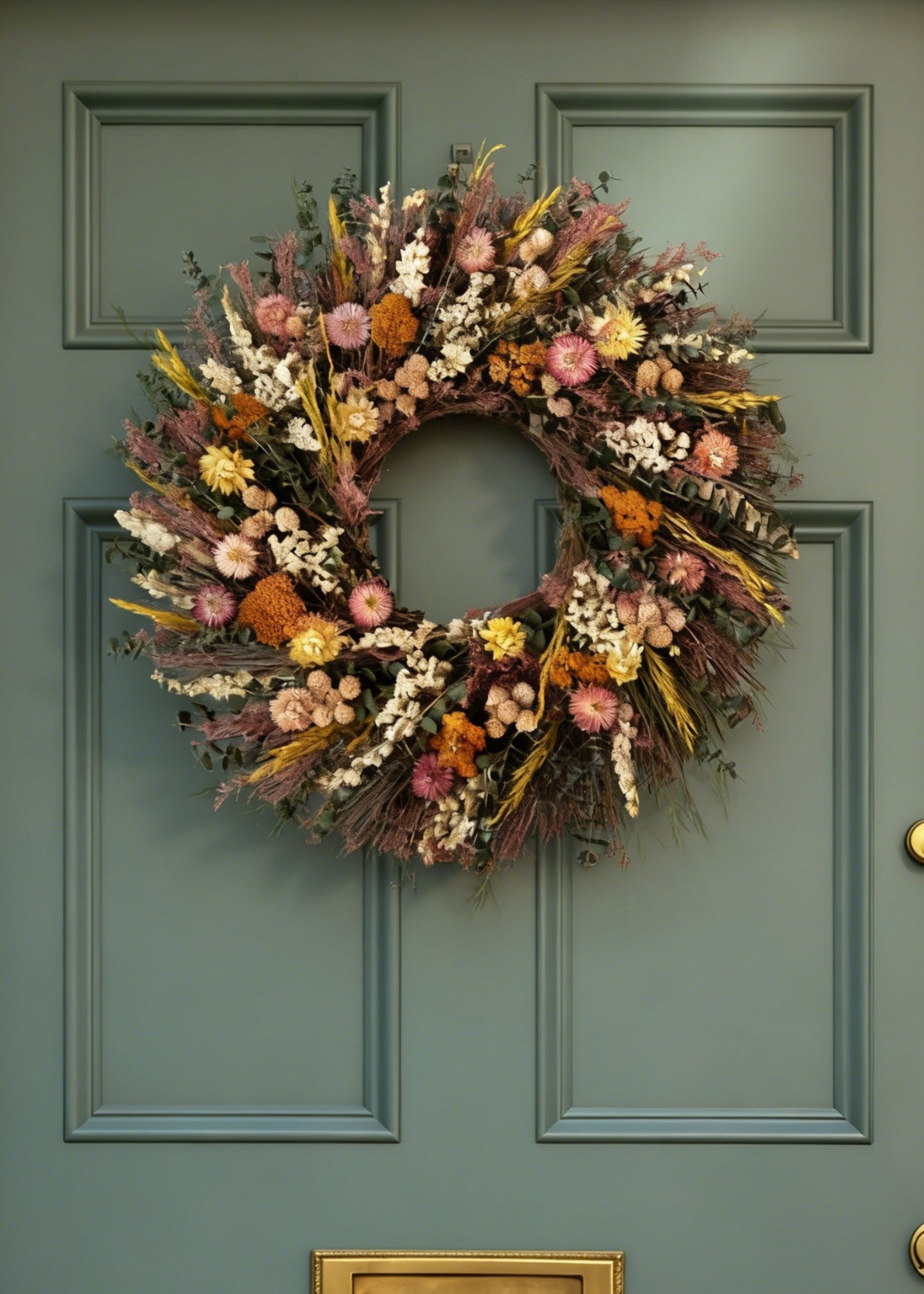 Pink and Purple Dried Flower Wreath on a Green Door