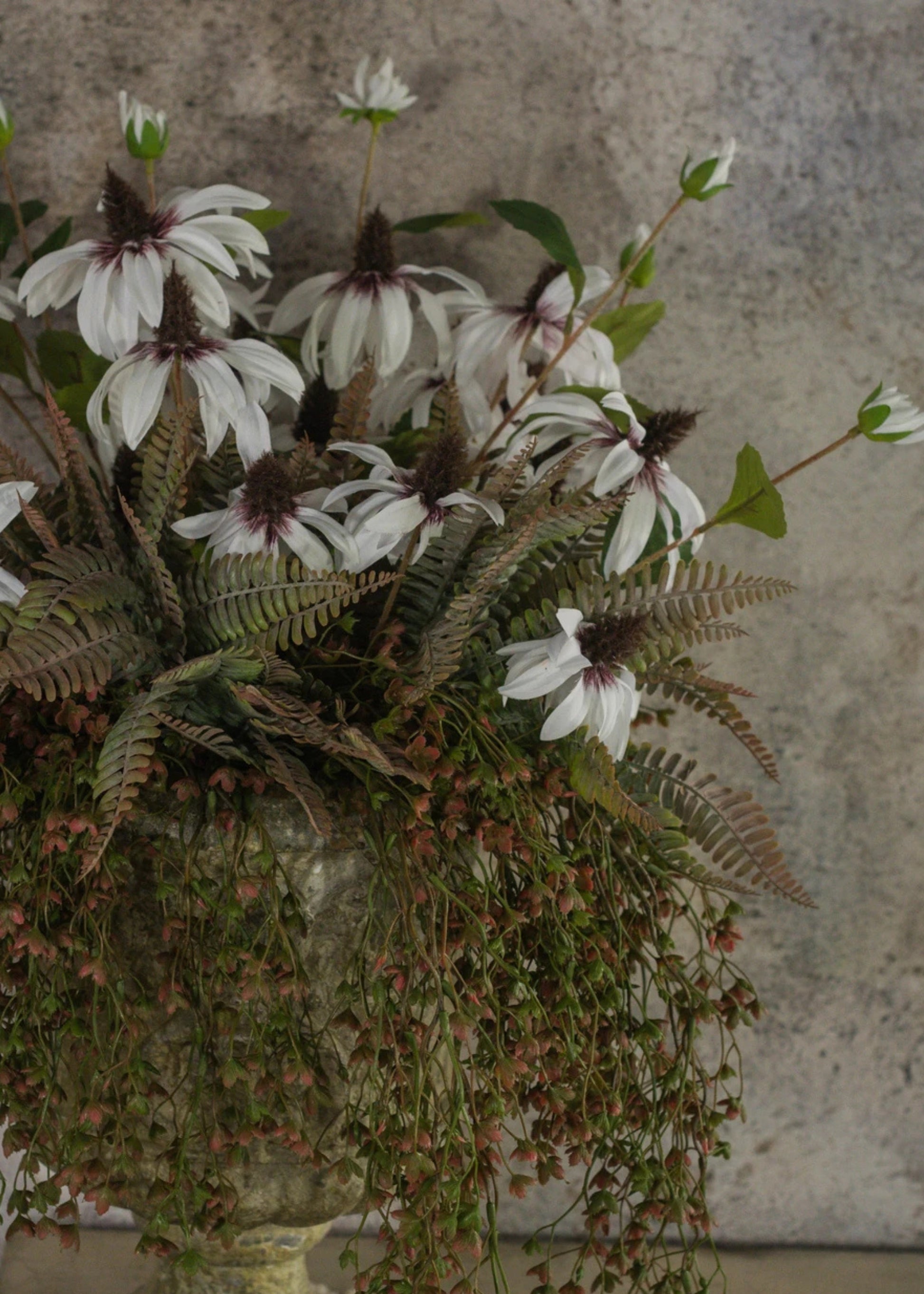 Floral arrangement of White Artificial Black-Eyed-Susan Wildflowers and ferns