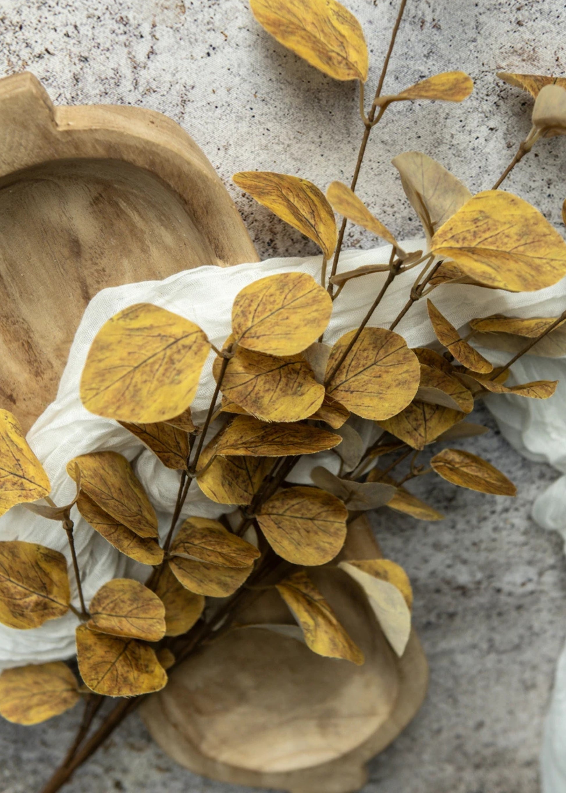 Close-up of a Autumn Yellow Artificial Eucalyptus Leaf Branch 