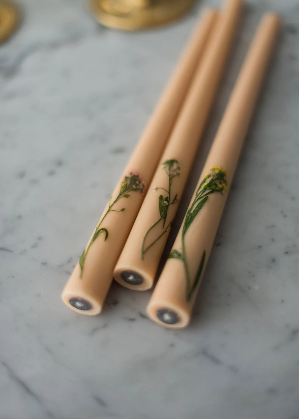 candles with floral inlay