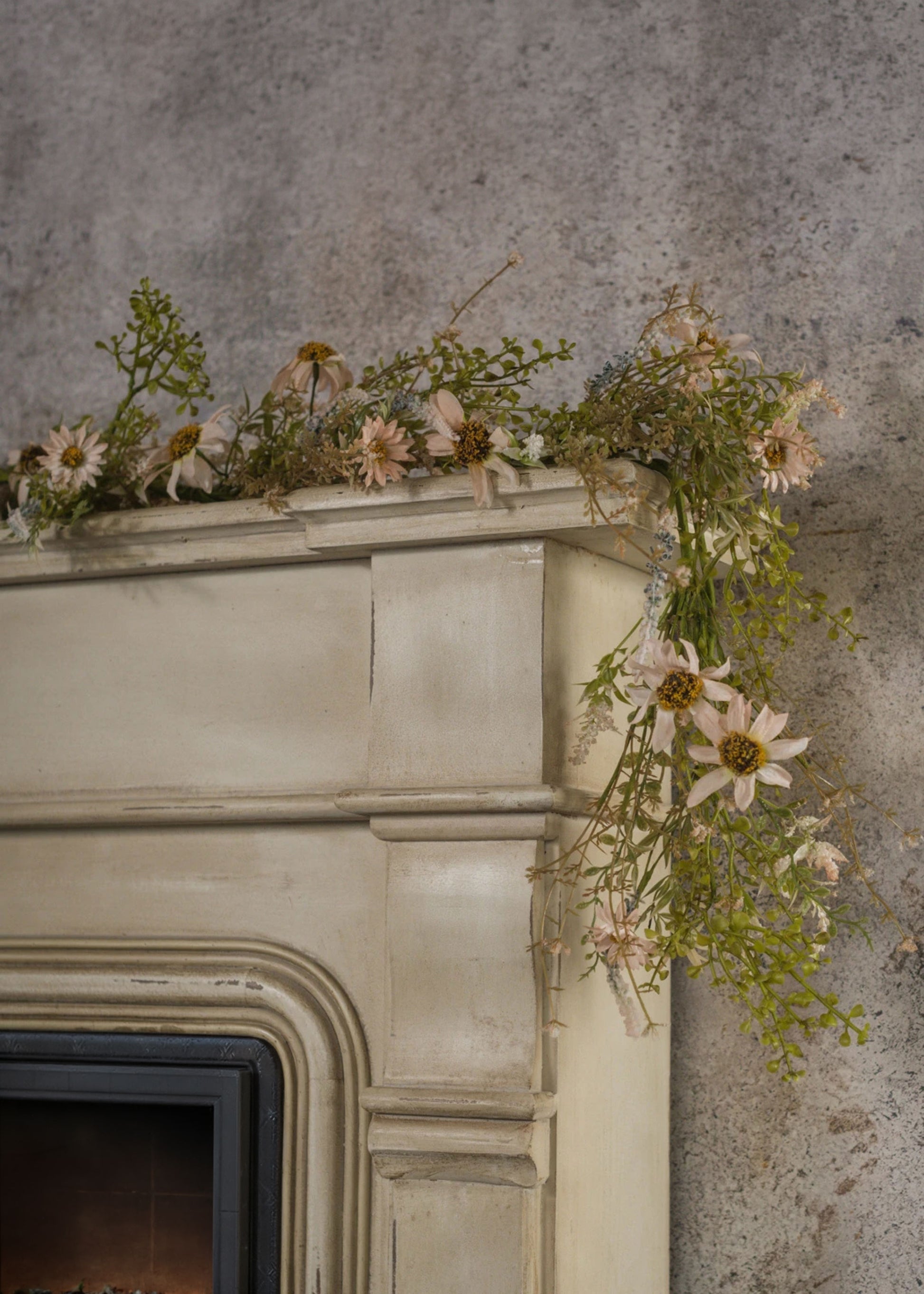 Artificial Wildflower Garland in Pale Pink on a Mantel