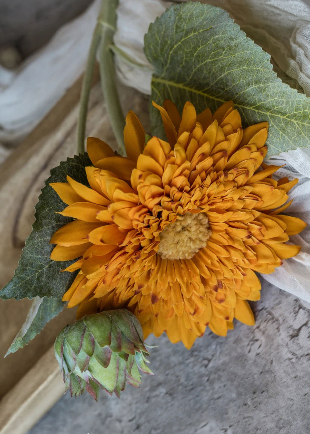 Close-up of an Artificial Sunflower in Autumn Orange