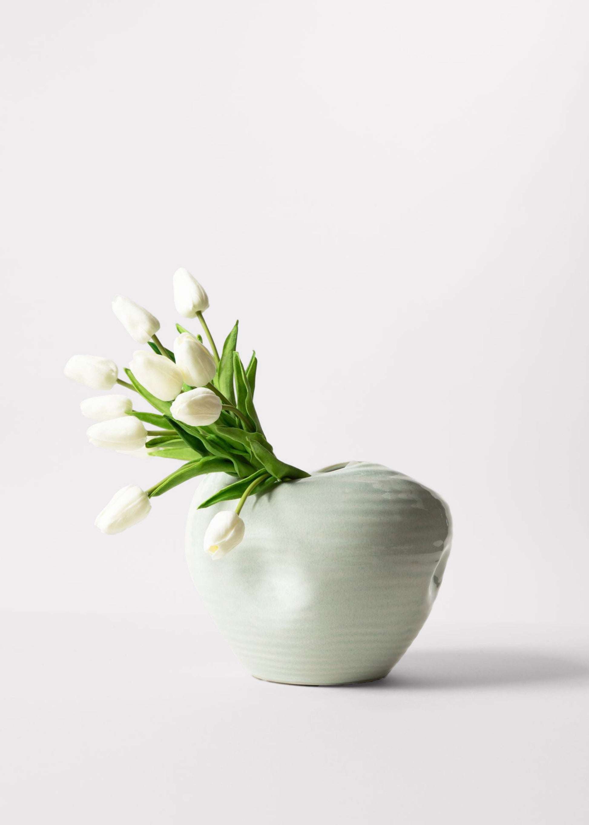 real touch tulips in green ceramic vase
