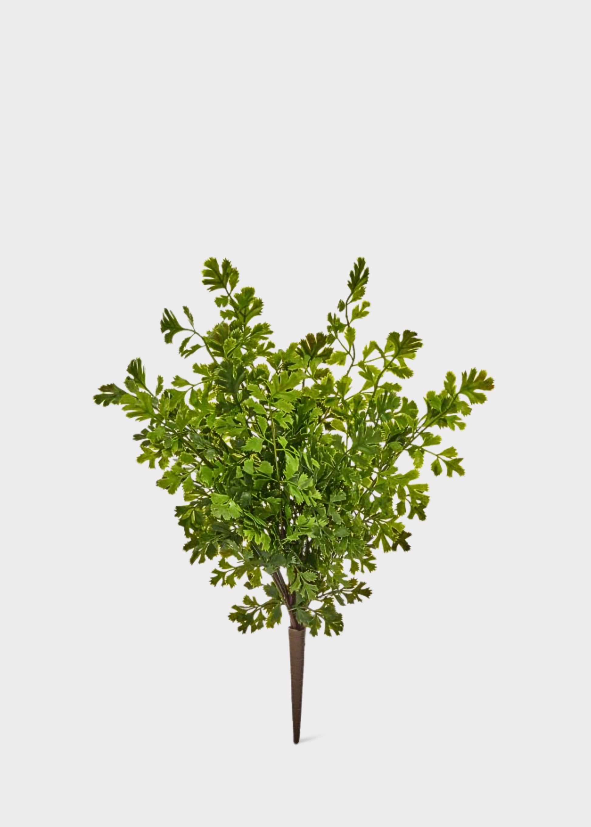 Artificial green fern bush