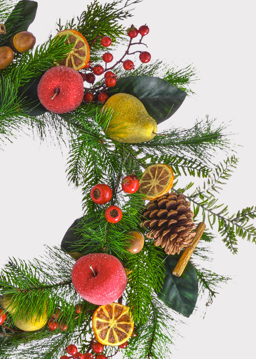 Close-up of a Red and Green Artificial Winter Pine and Mixed Fruit Wreath