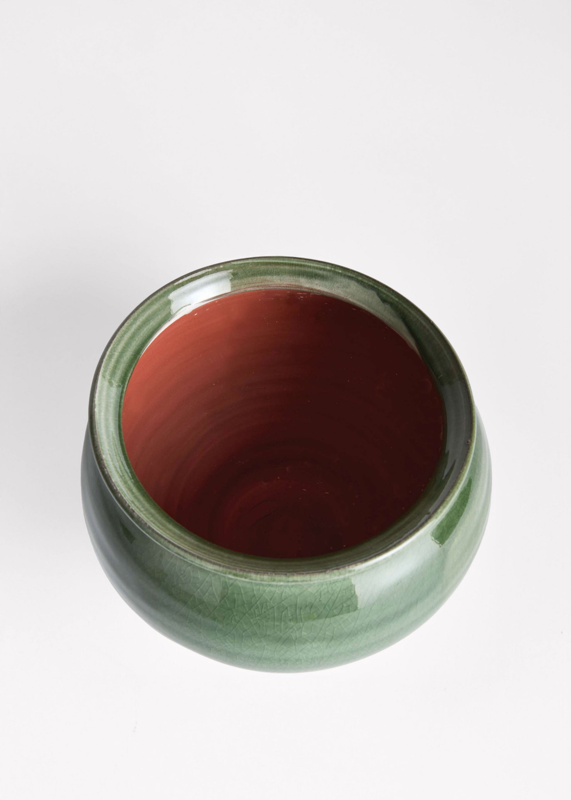 Opening of the green terra cotta vase